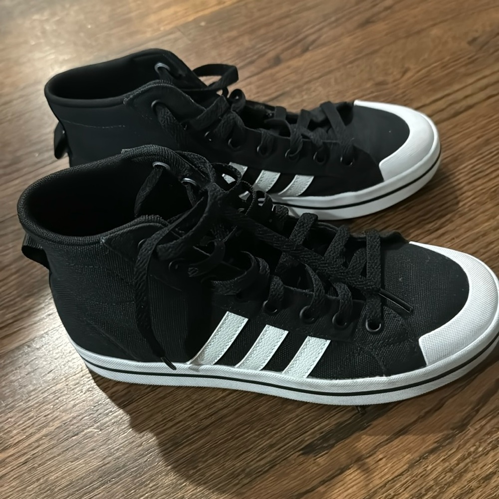 Like new women’s black Adidas high top